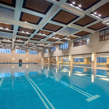 Wyndham Xinyang Downtown Hotel Bagian luar foto