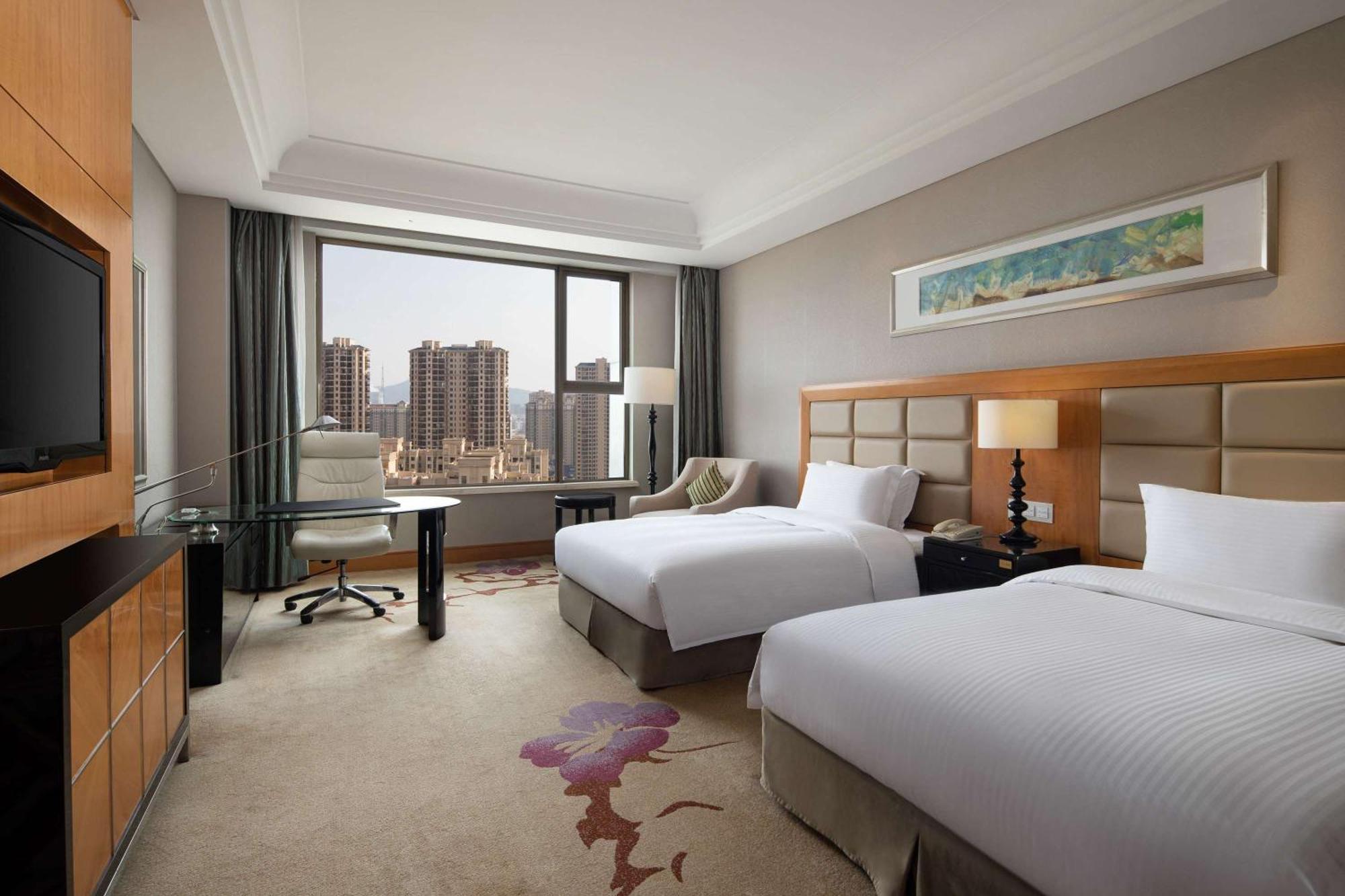 Wyndham Xinyang Downtown Hotel Bagian luar foto